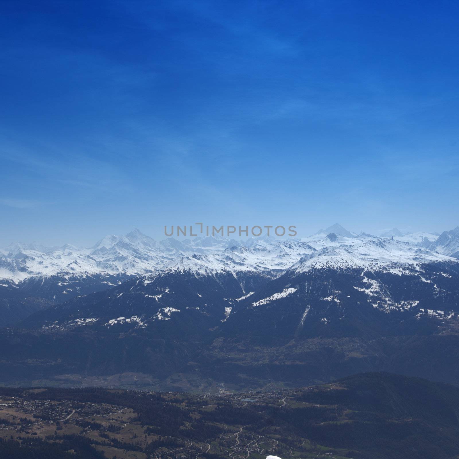 top of mountains sun in blue sky