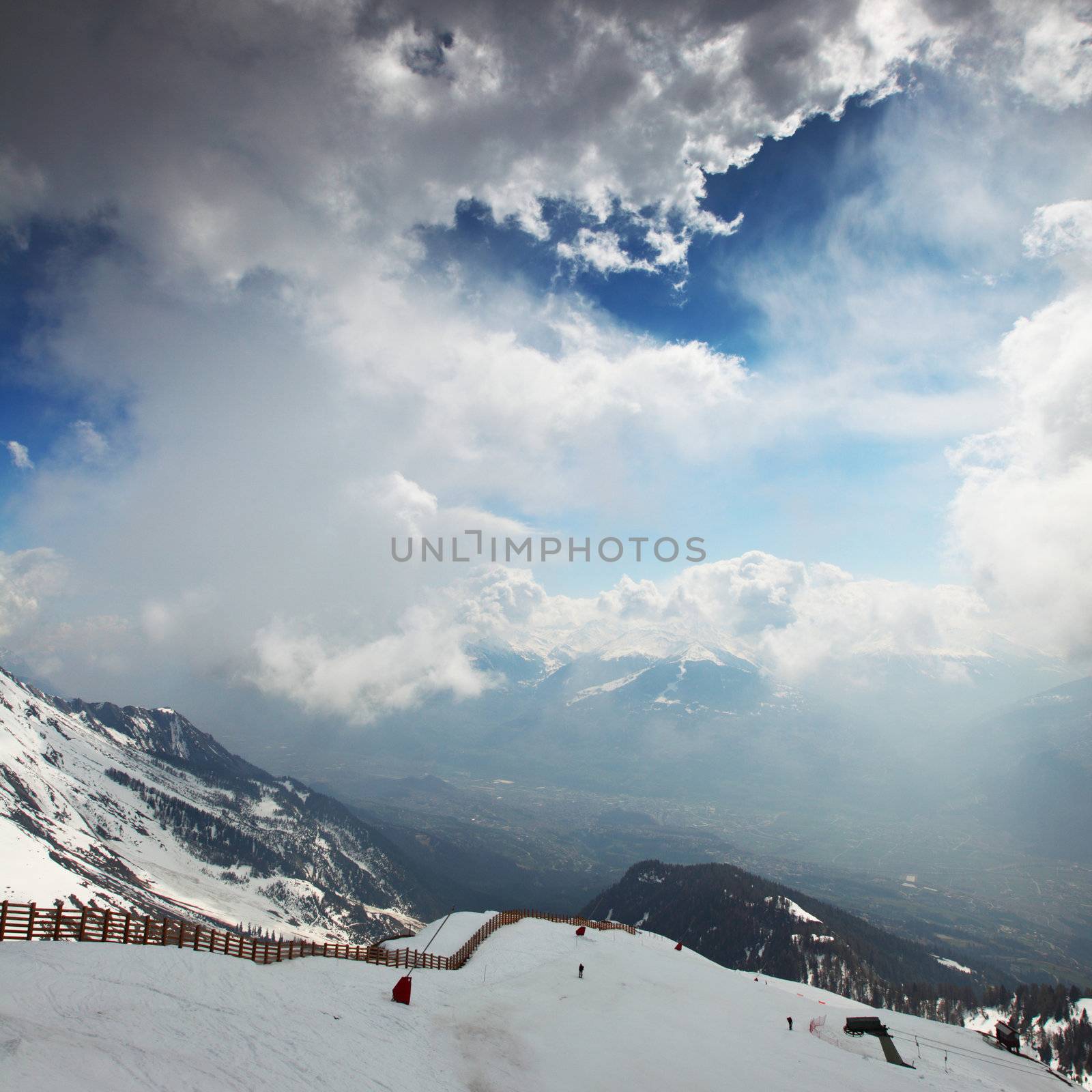top of mountains sun in blue sky