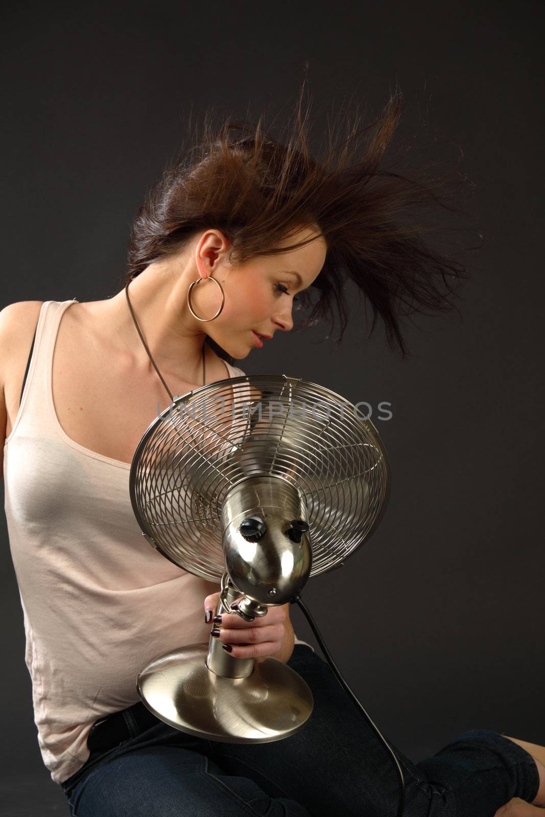 girl with fan studio portrait