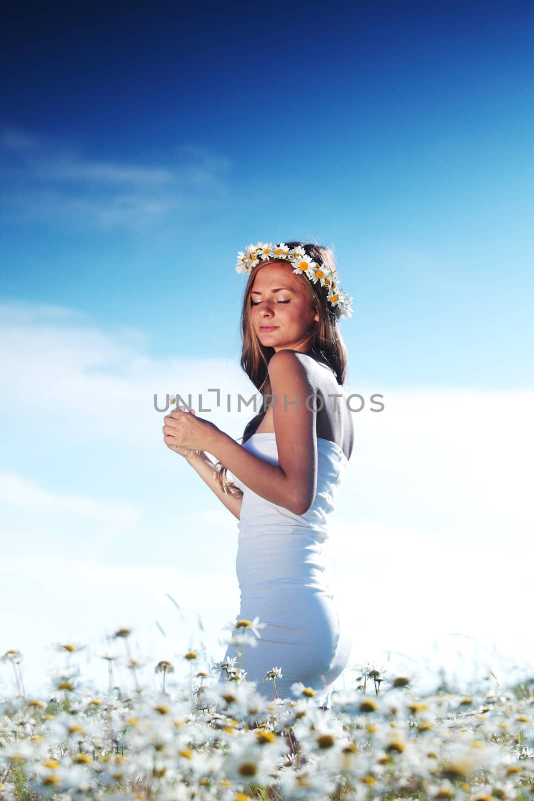 girl in dress on the daisy flowers field by Yellowj