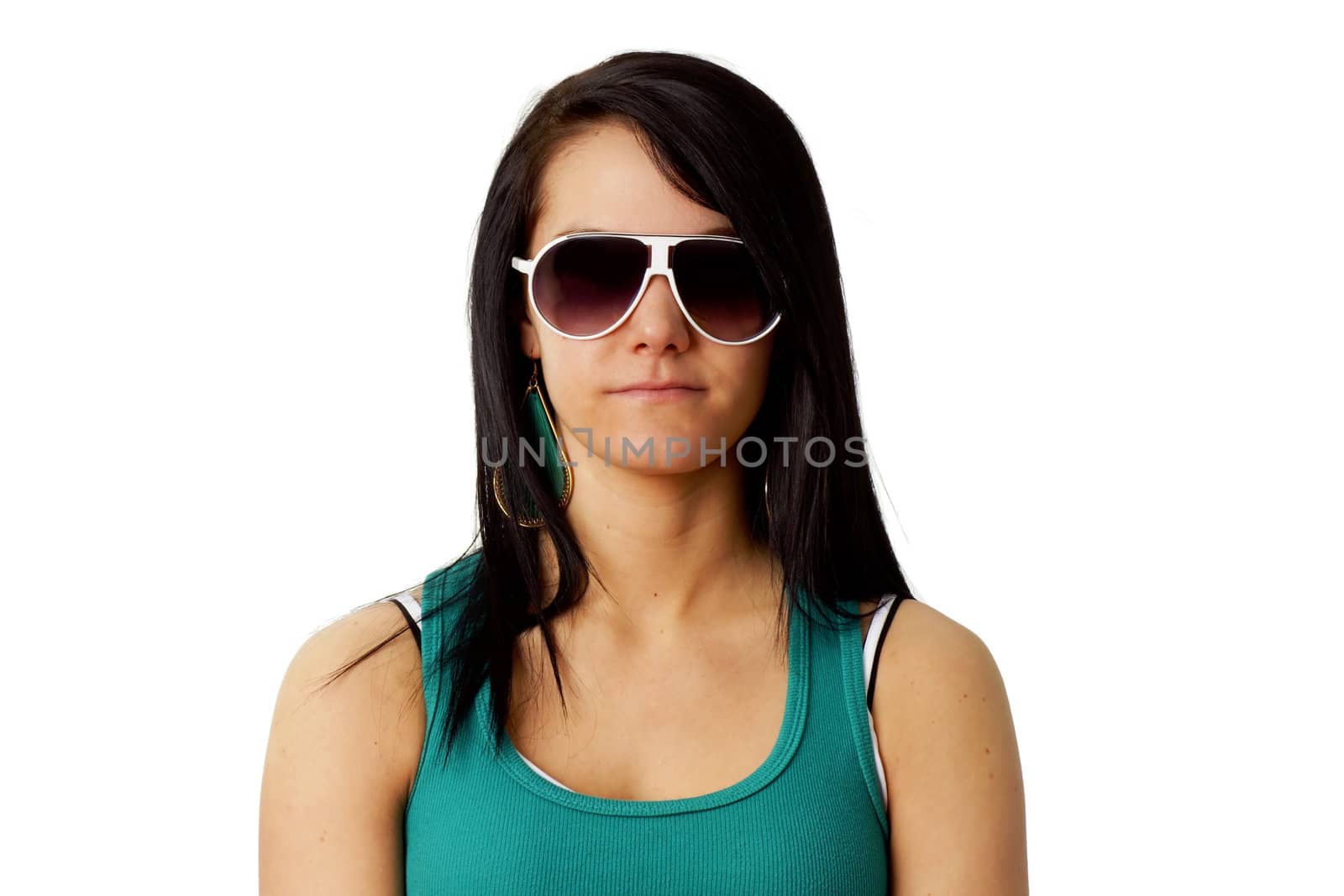 Portrait of a beautiful brunette with serious look hidden behind big sunglasses isolated on white background.