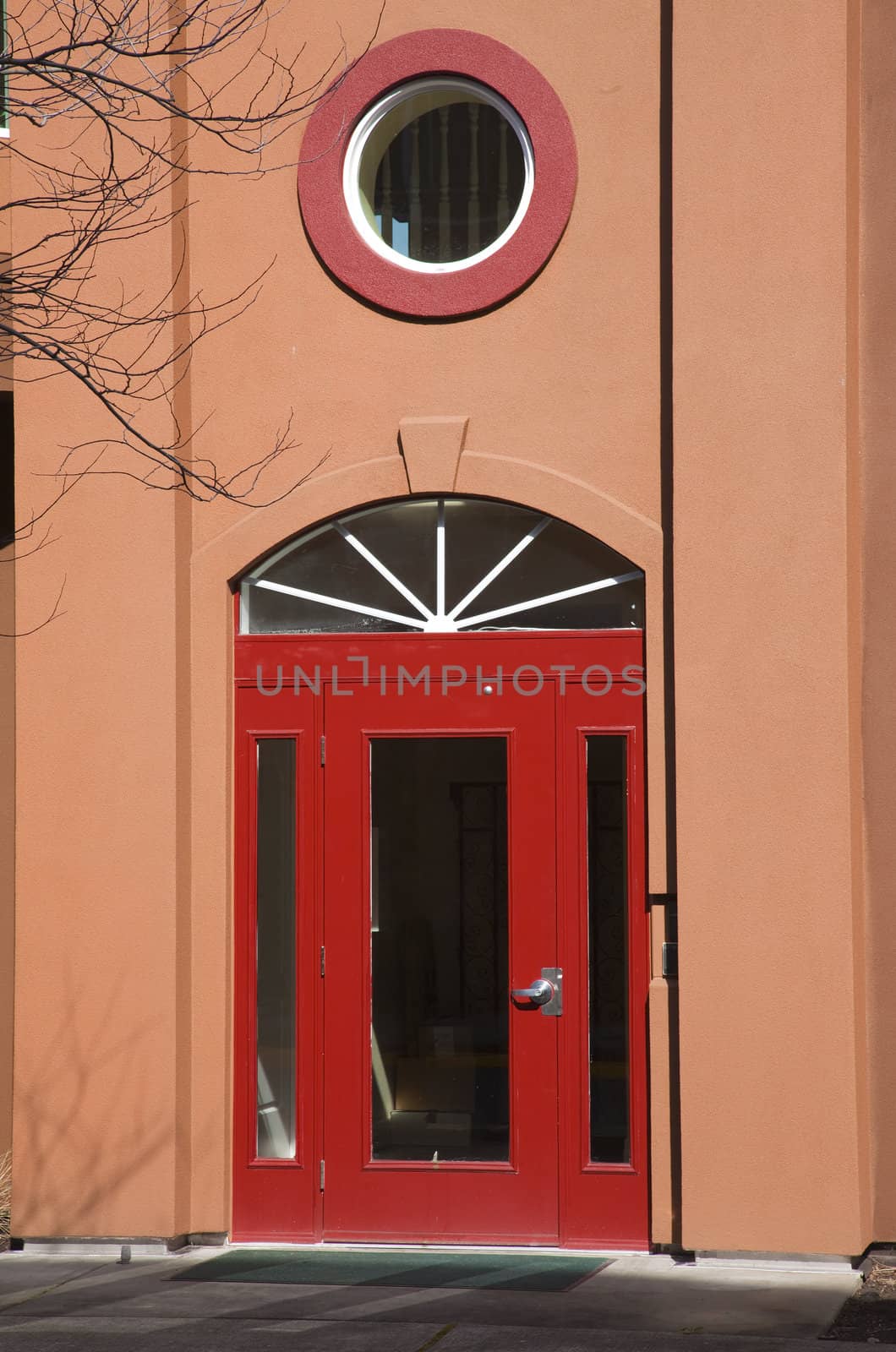 A red door condo entrance, Portland OR. by Rigucci