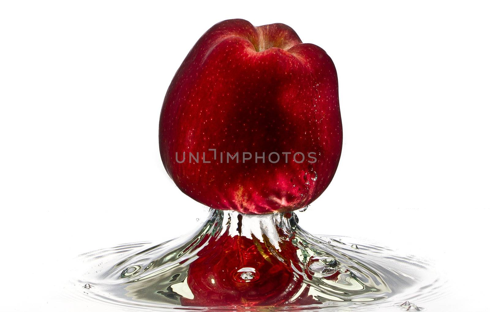 Red apple water splash high speed splash