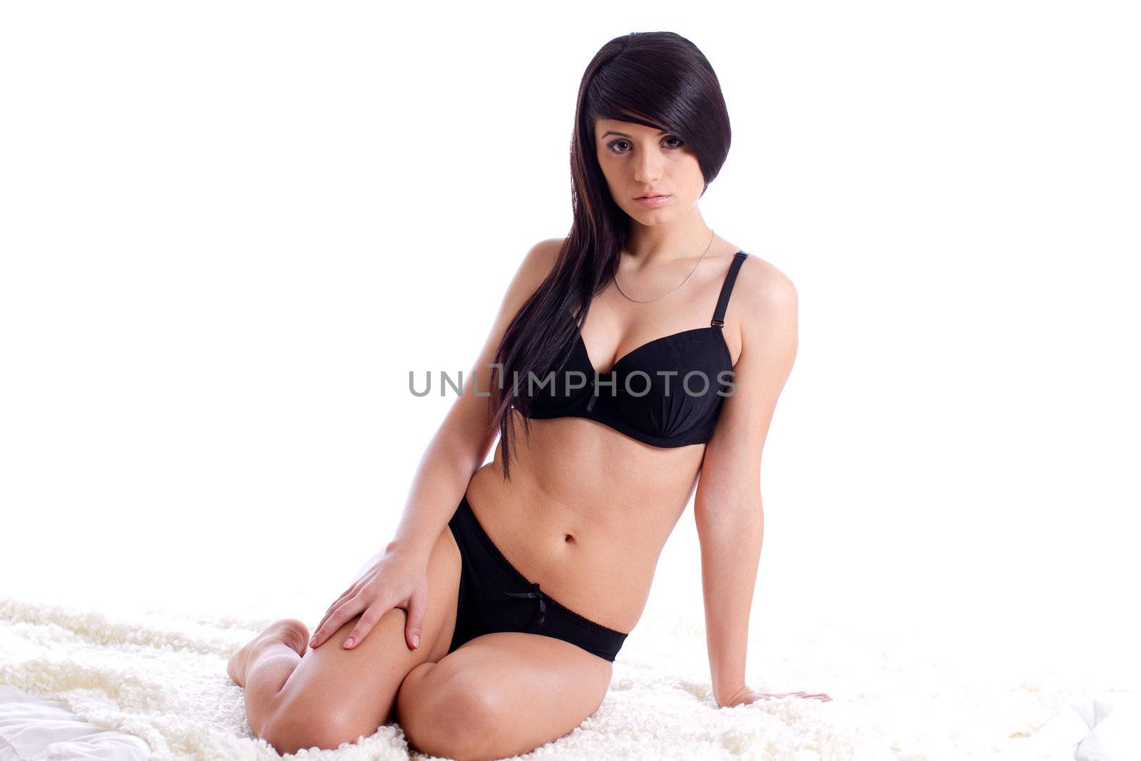 Beautiful fasion model in lingerie in bed by tpfeller