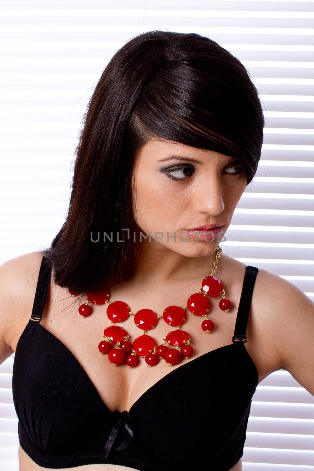 Beautiful fashiom model portrait dark hair with jewelry 