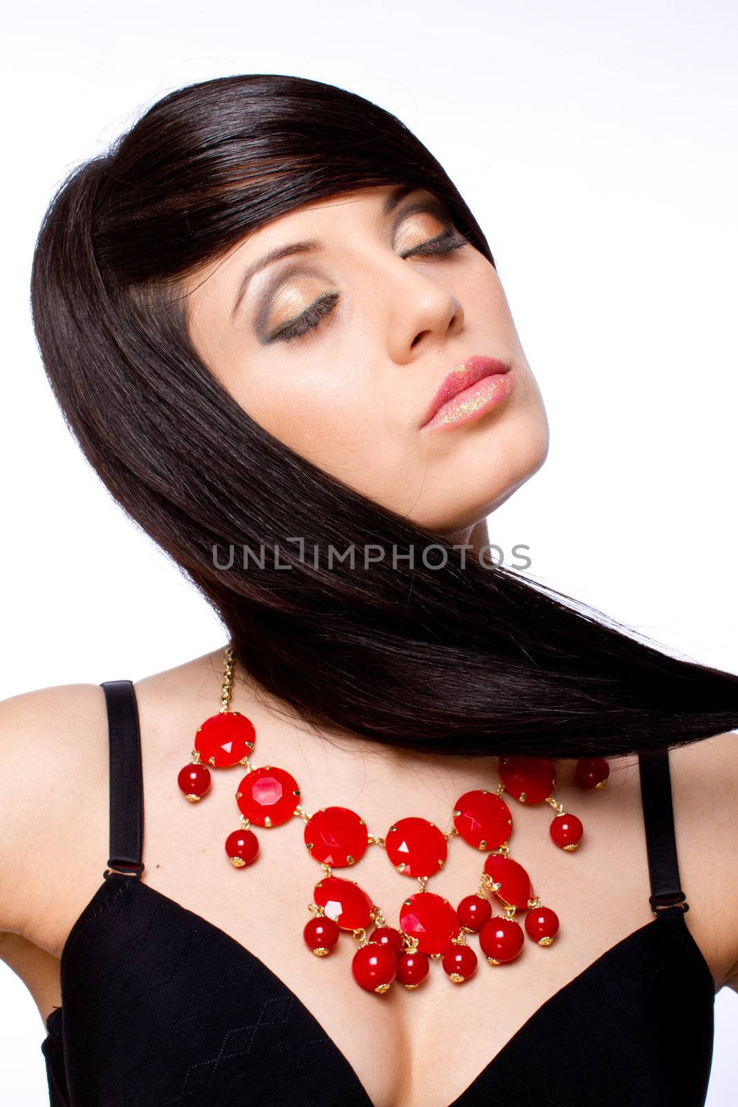 Beautiful fashiom model portrait dark hair with jewelry 