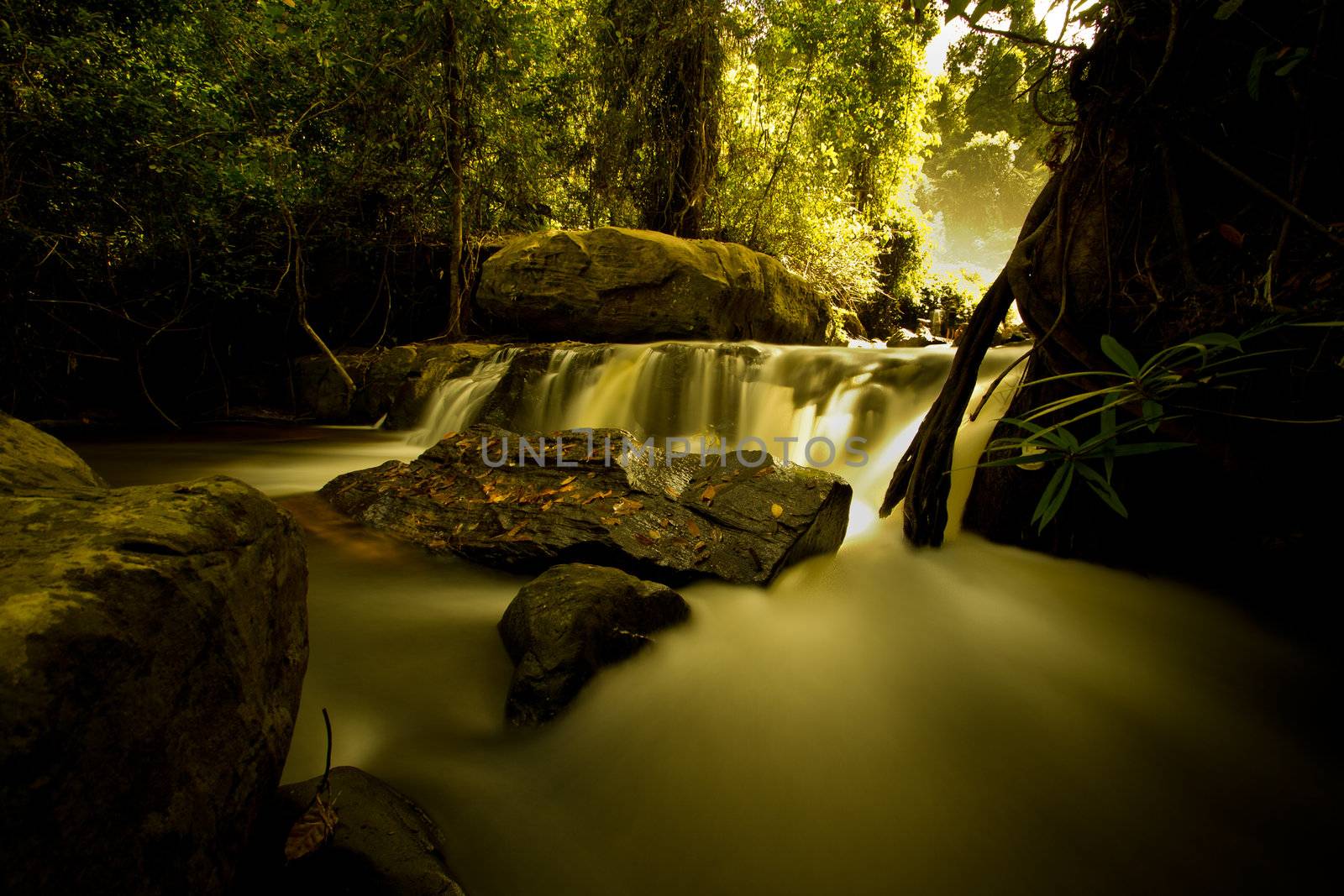 Waterfall in picturesque environment, long exposure