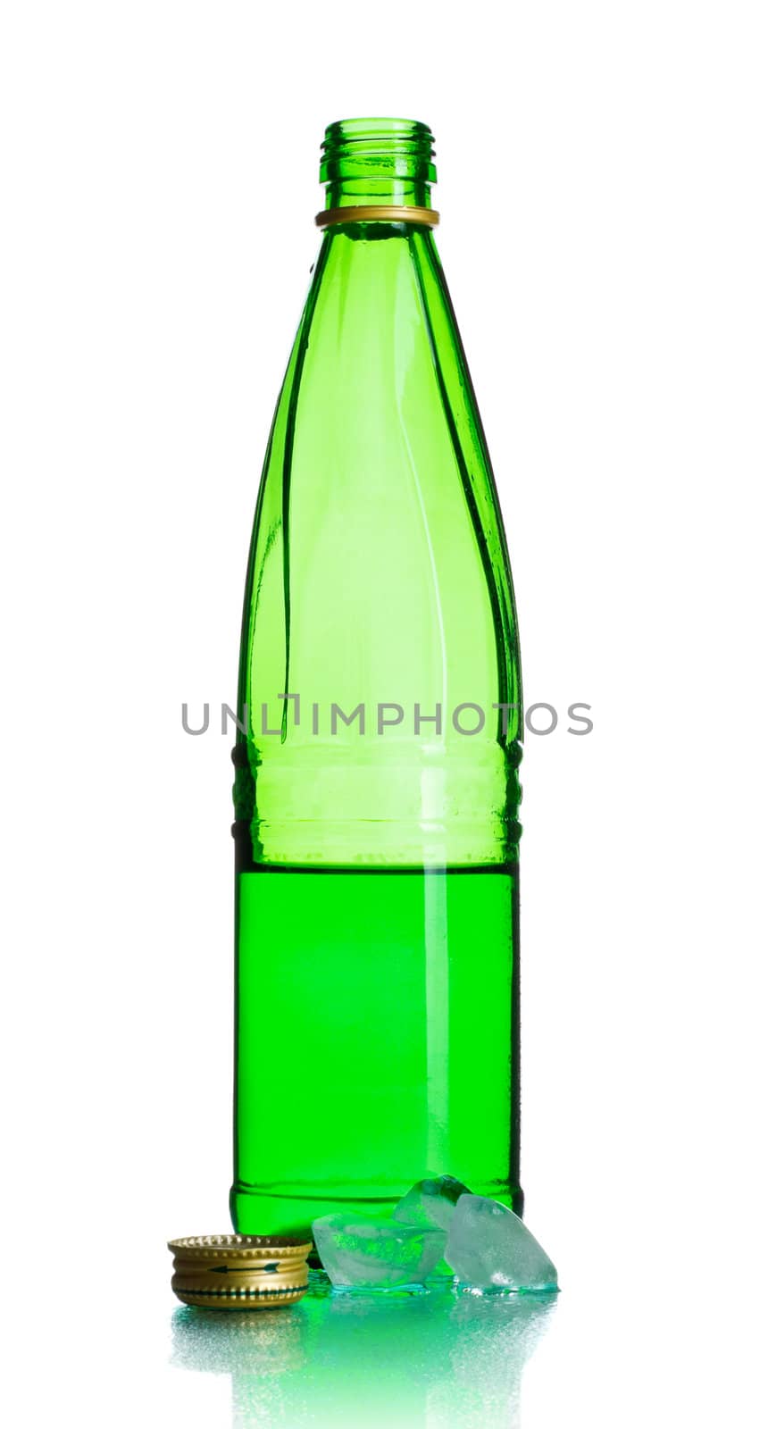 green soda bottle and ice cubes, white background