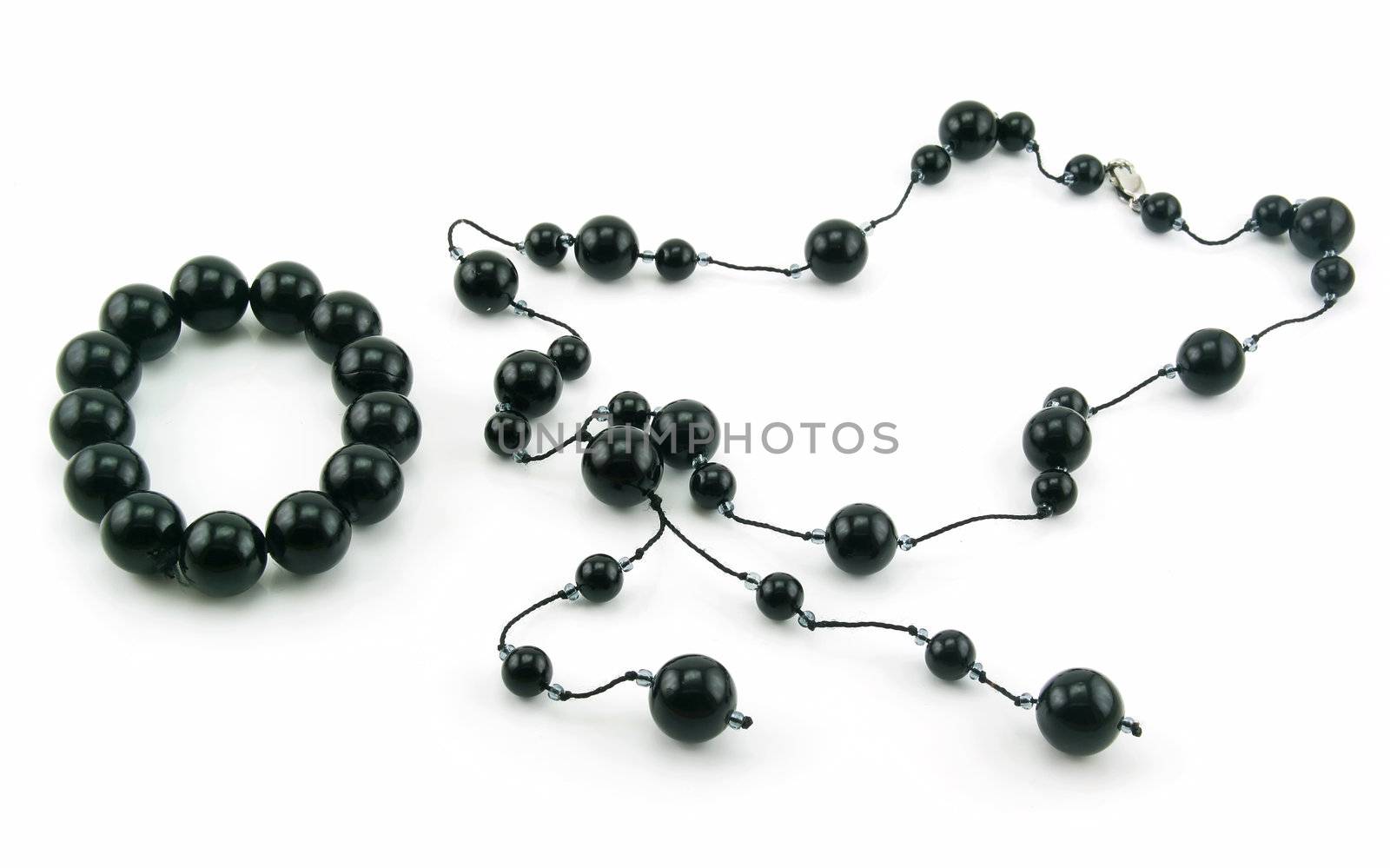 Black Pearl Bracelet and Necklace Isolated on White Background