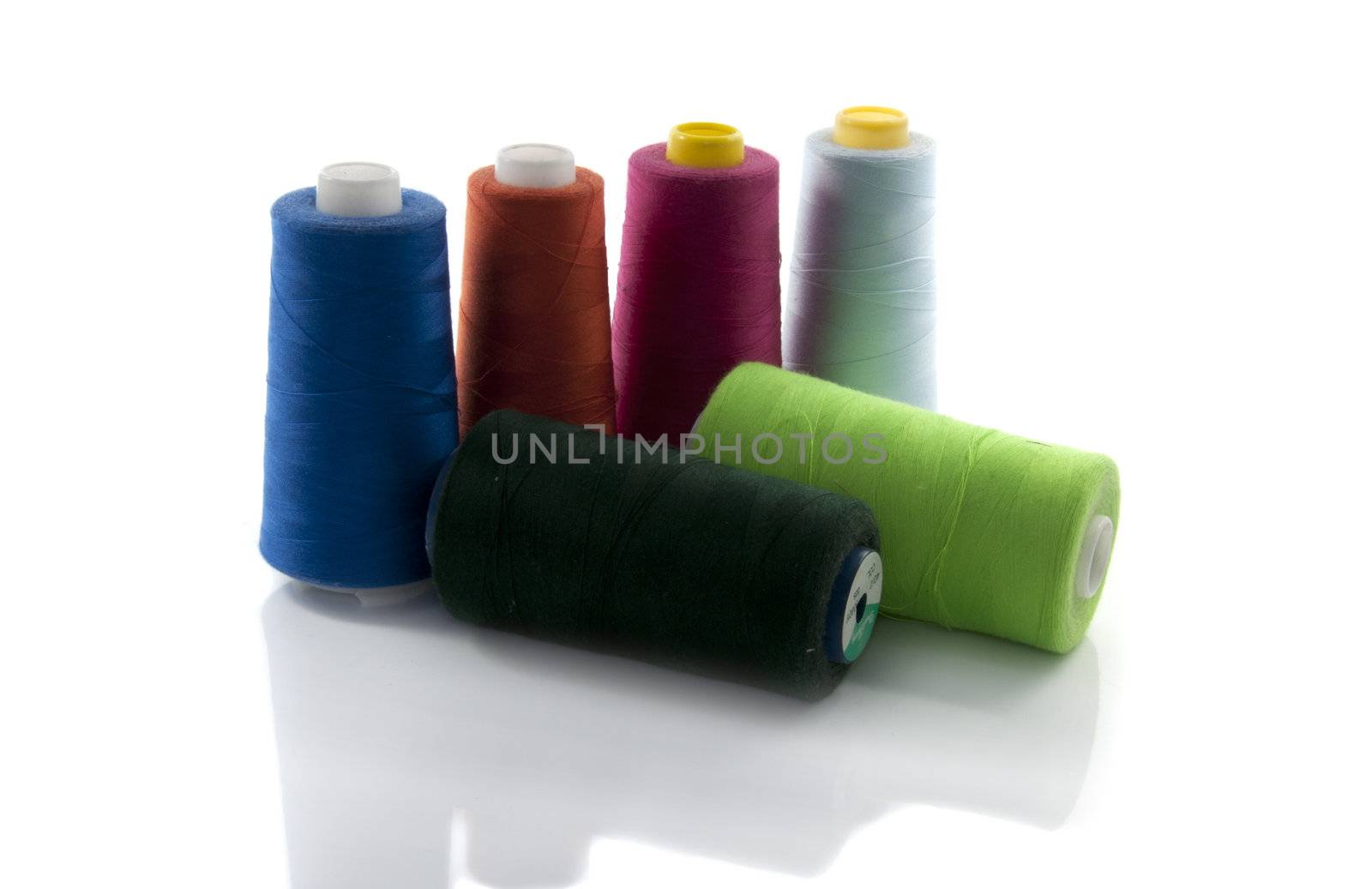 spools with cotton for manufacturing and sewing