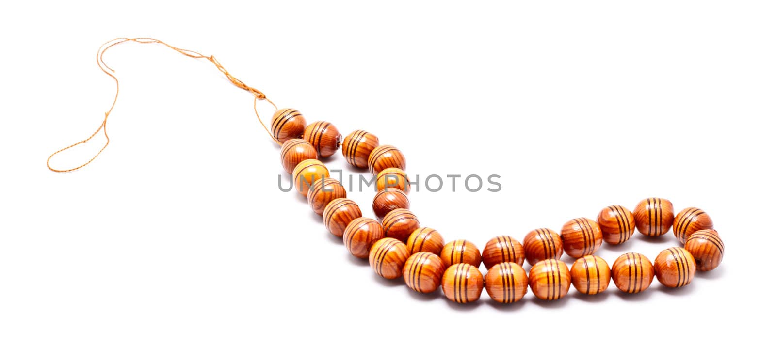 wooden pearl necklace isolated on white background
