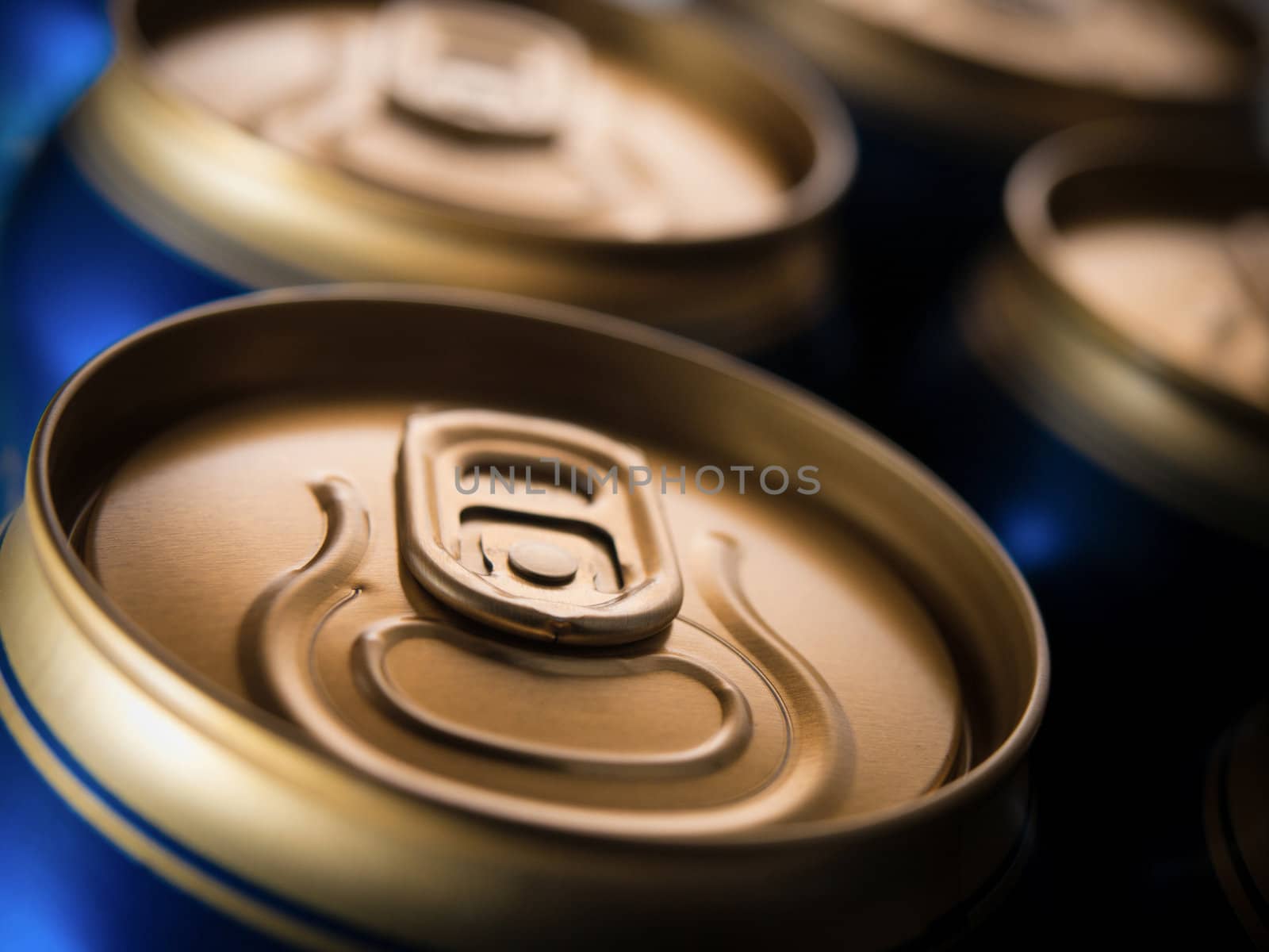 Top part of beer cans, close up view