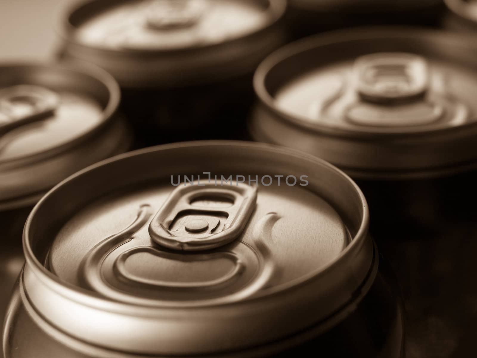 Top part of beer cans, close up view