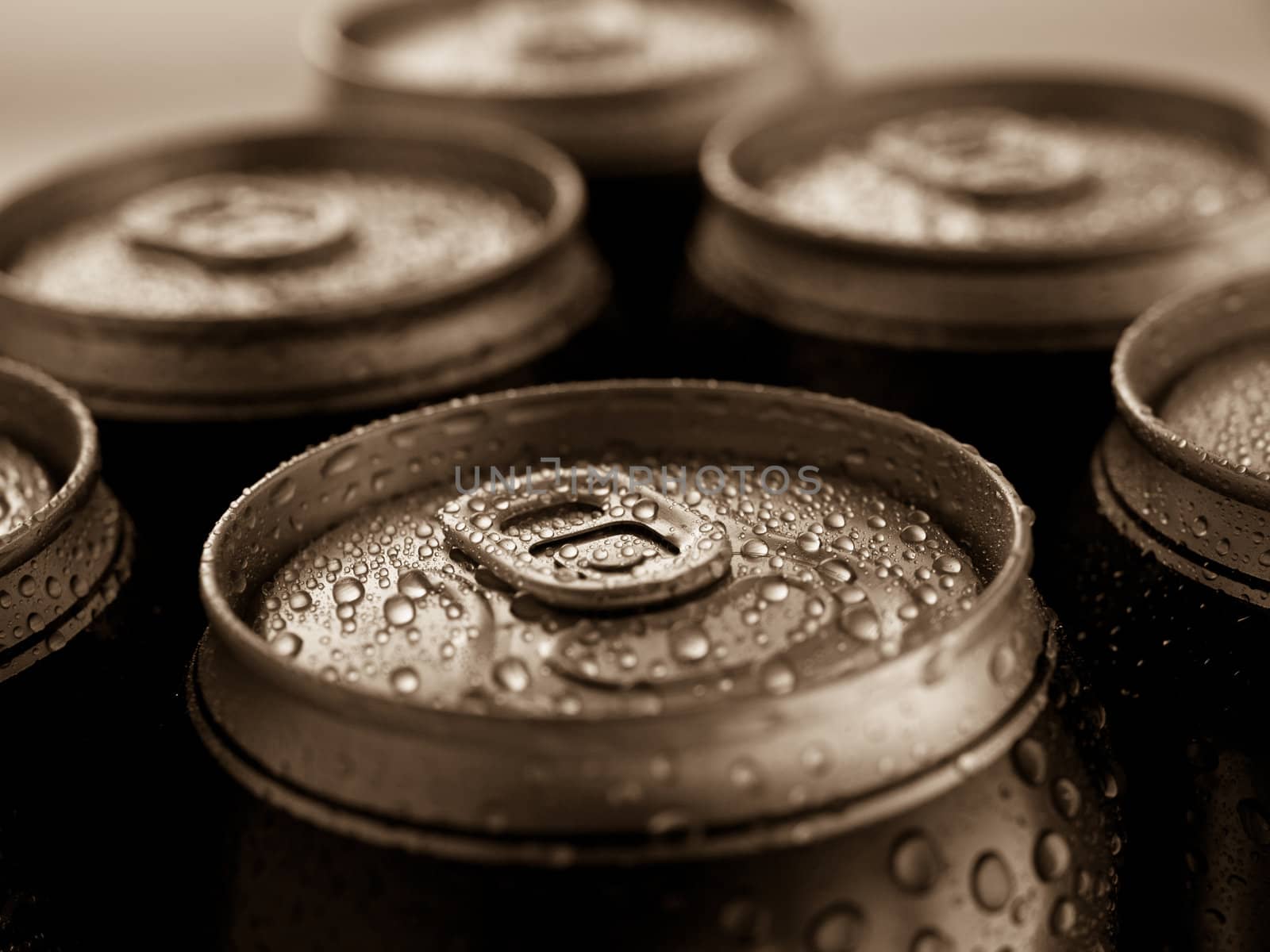 Top part of beer cans, close up view