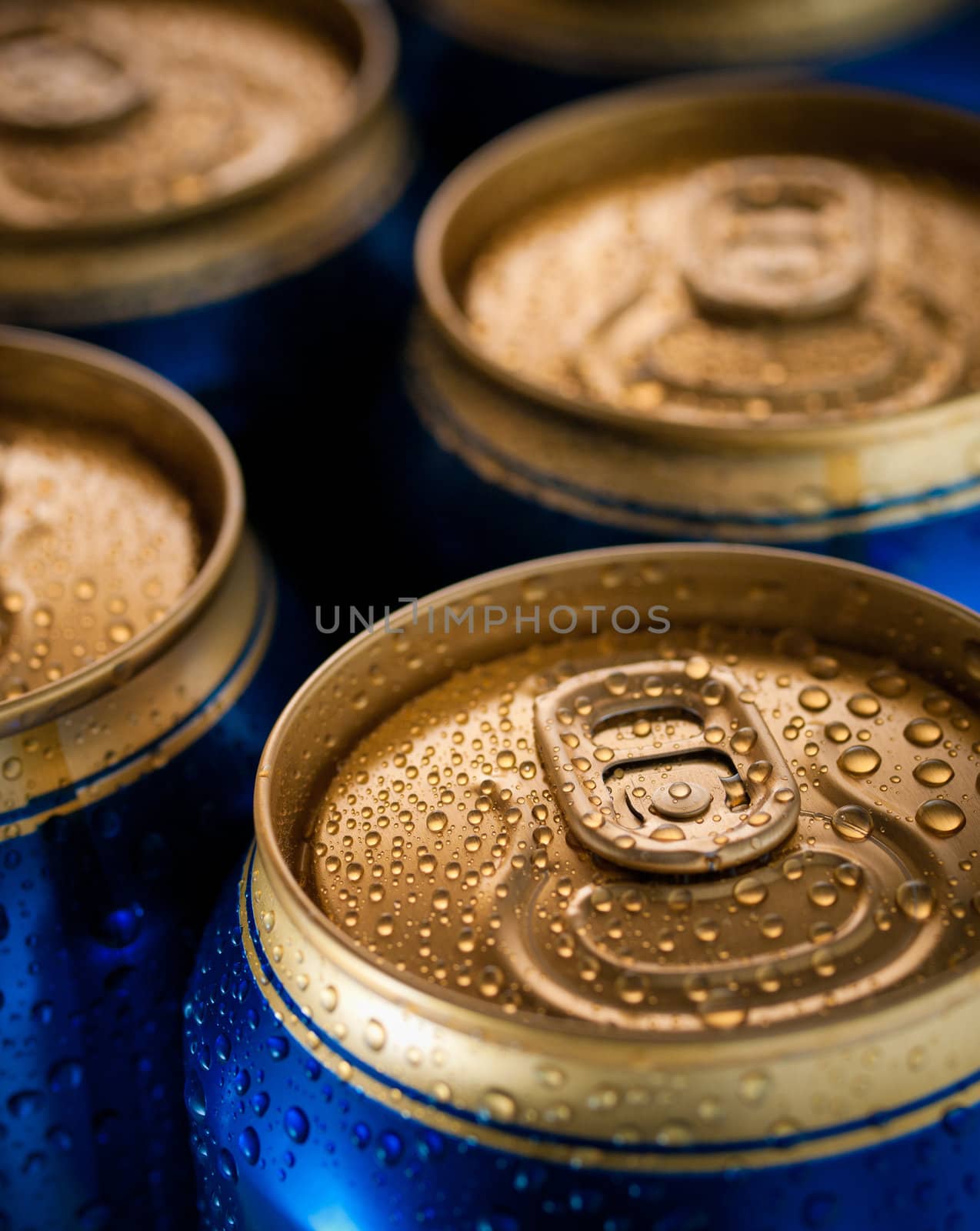 Top part of beer cans, close up view