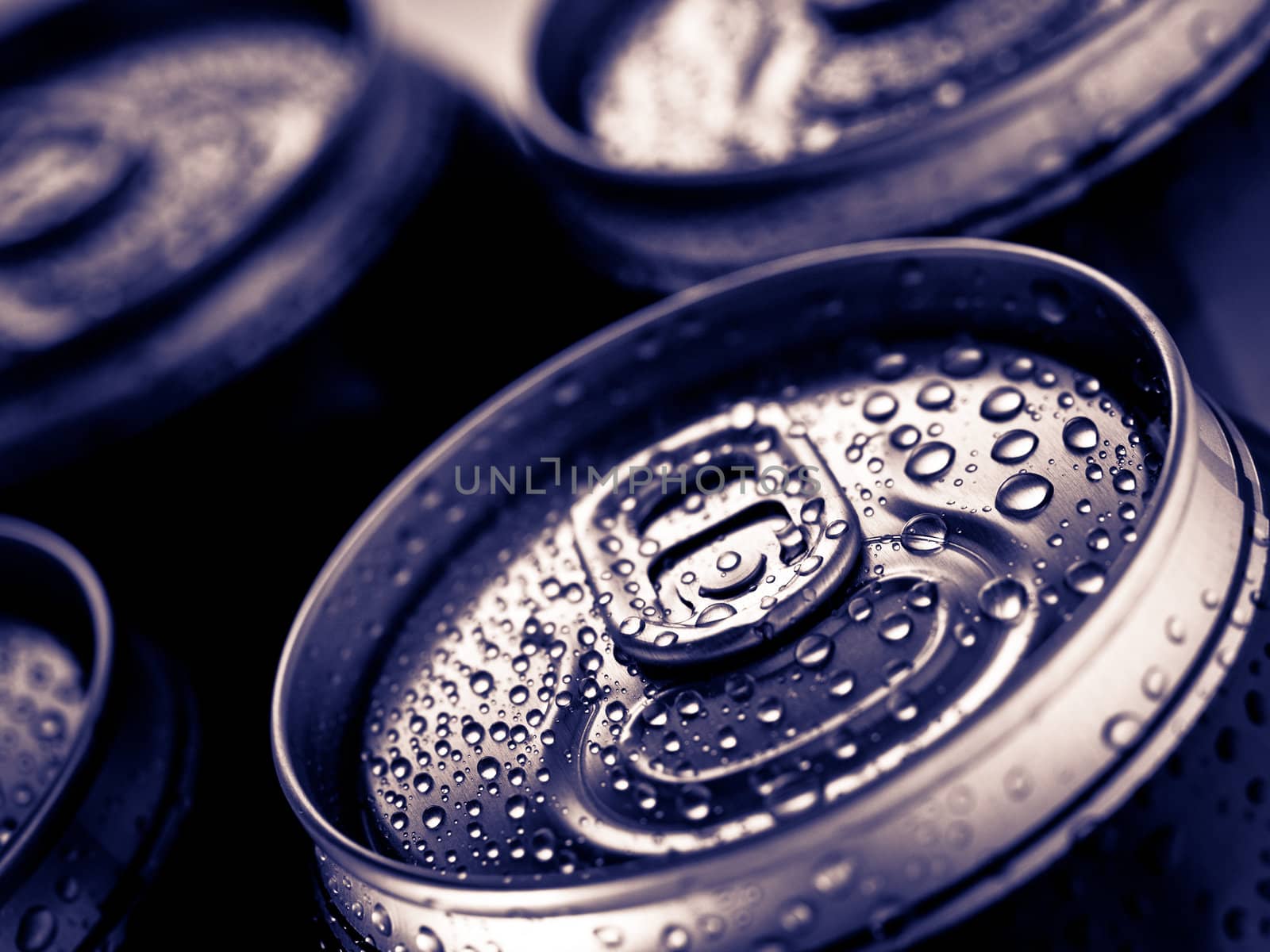 Top part of beer cans, close up view