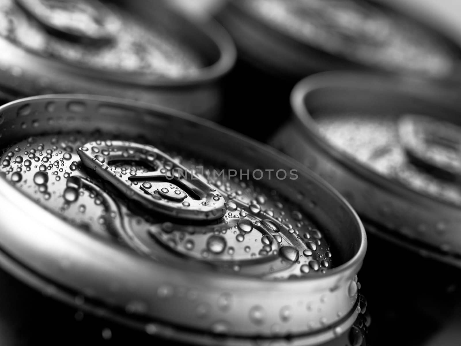 Top part of beer cans, close up view