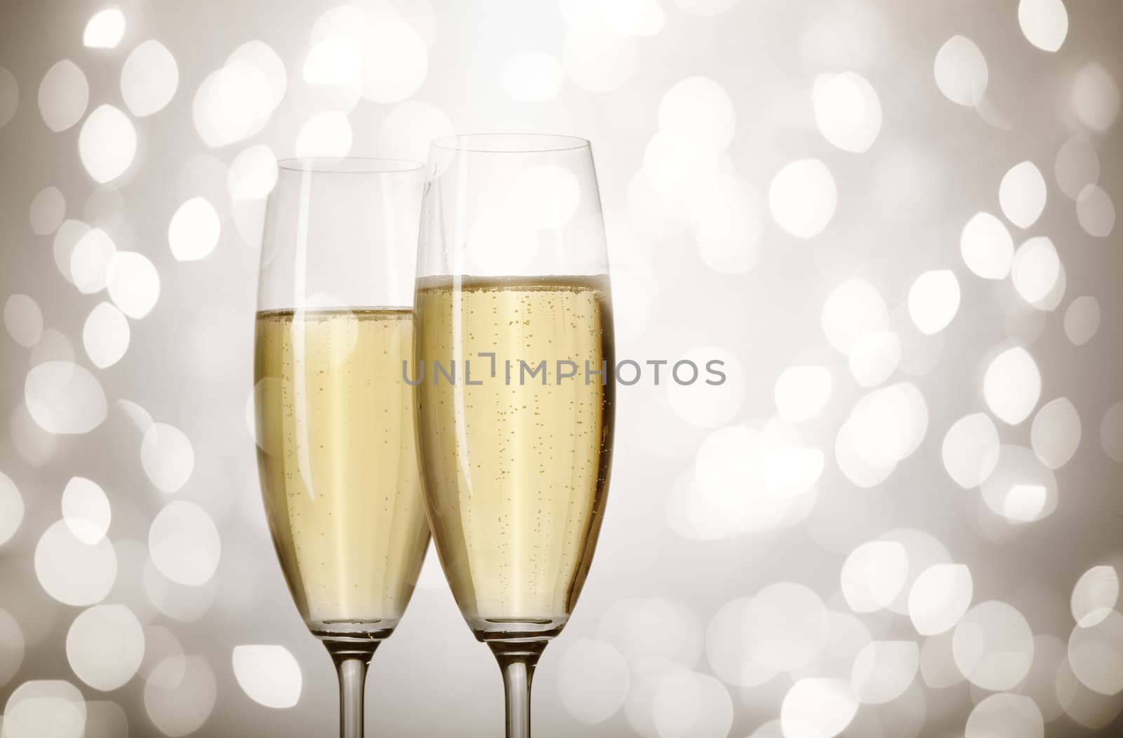 Closeup of flutes of champagne , selective focus on nearest