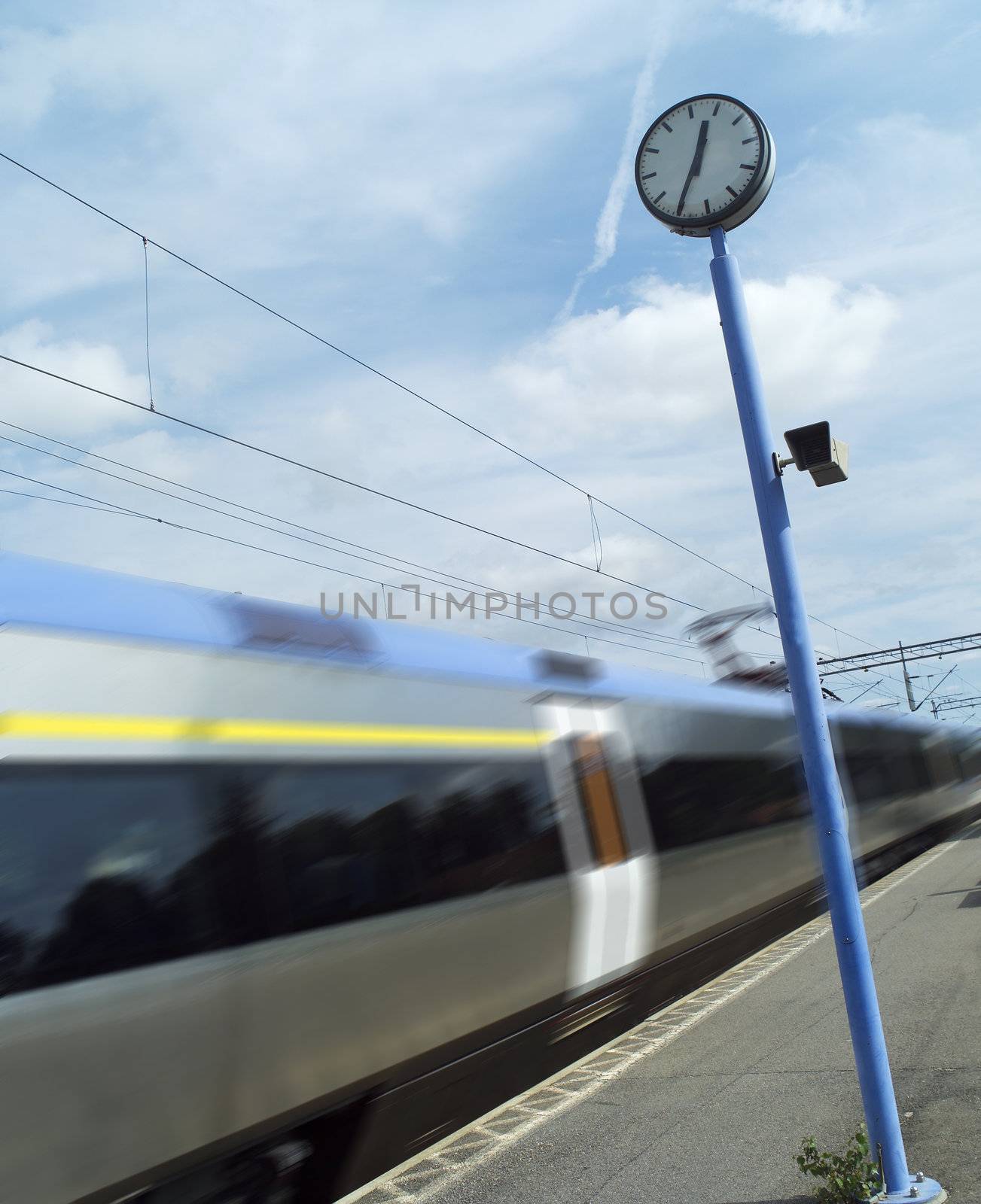 Train at the station towards blue sky