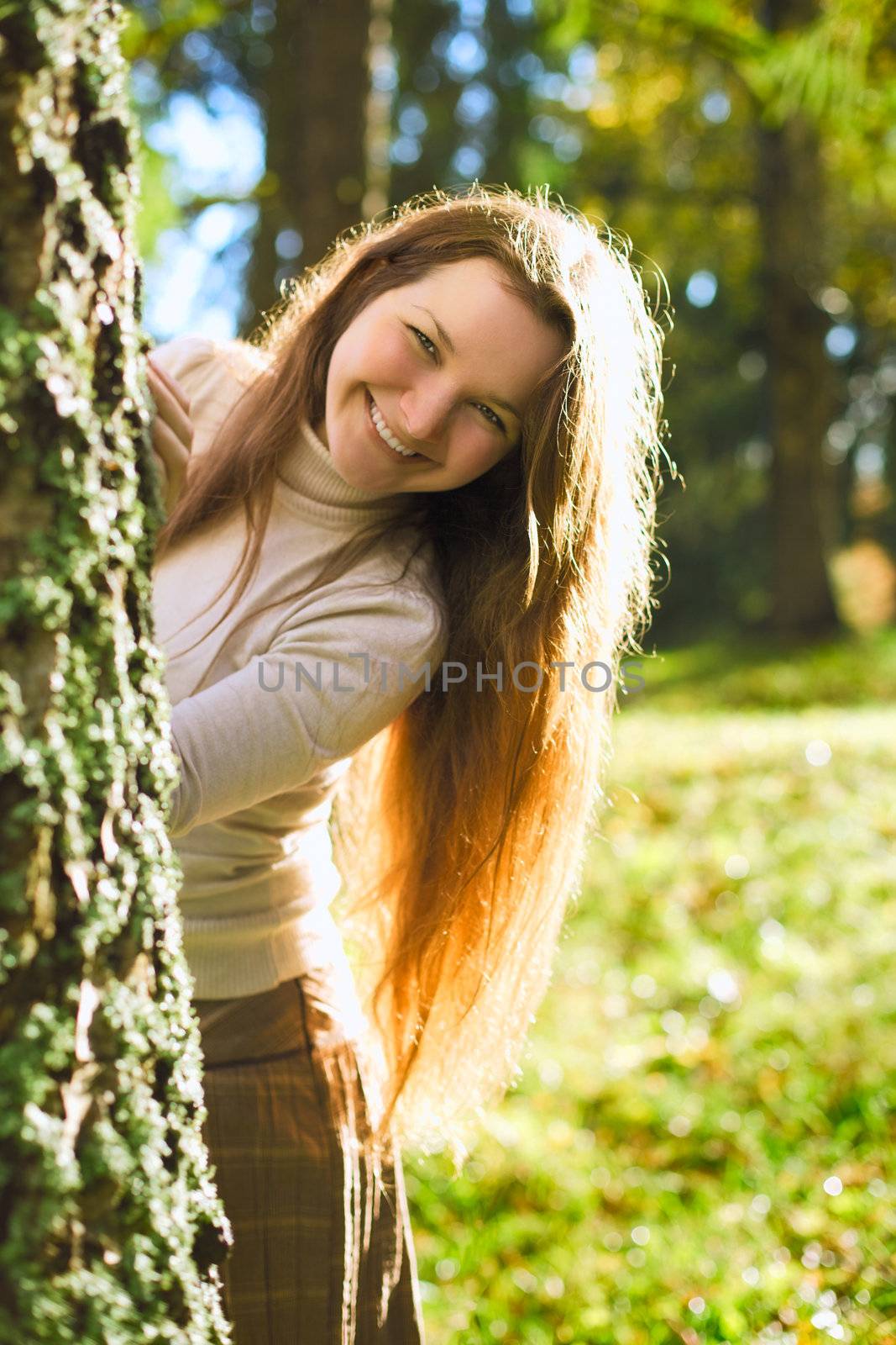 Girl in Autumn Forest by petr_malyshev