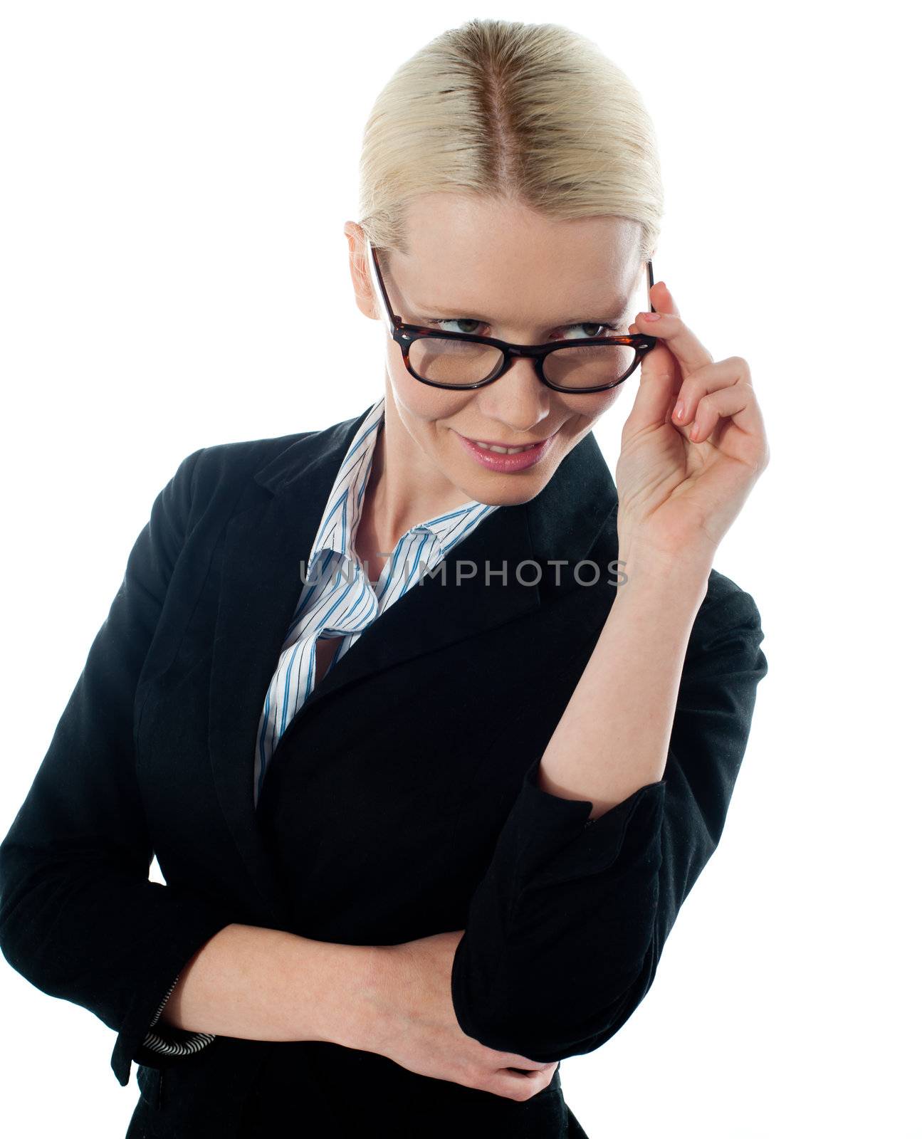 Corporate woman taking a closer look from within her glasses isolated on white background