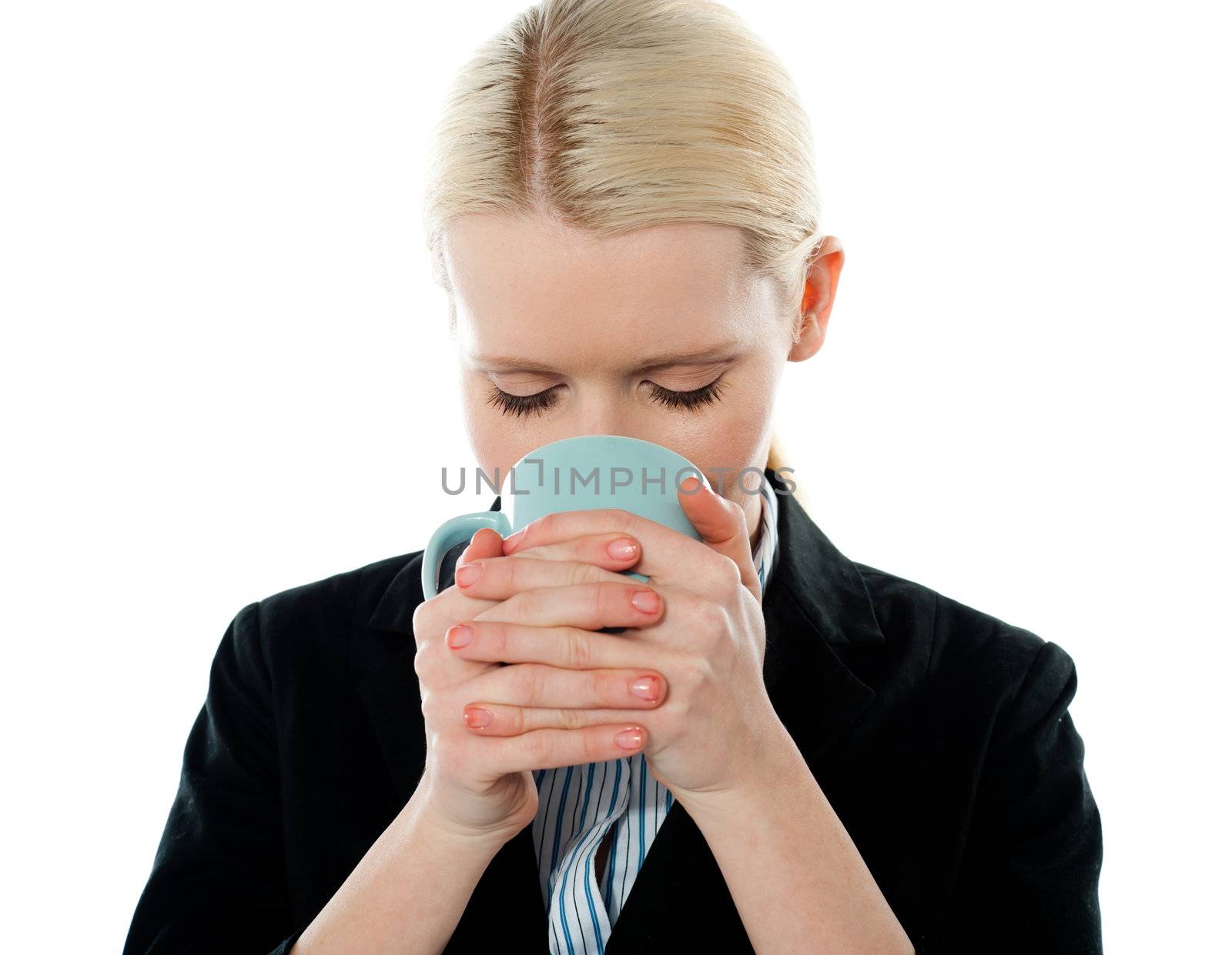 Businesswoman drinking coffee isolated on white