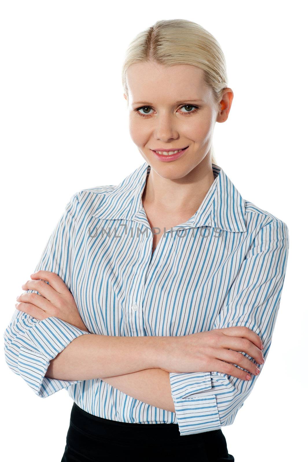 Glamourous female executive posing with folded arms isolated over white background