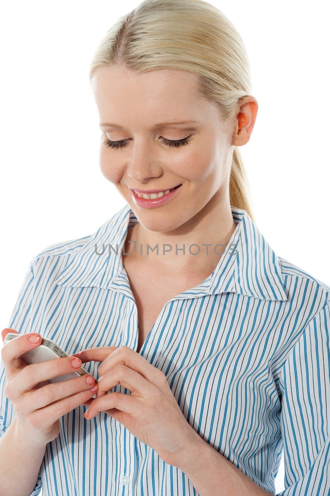 Stylish corporate female texting on phone isolated over white background