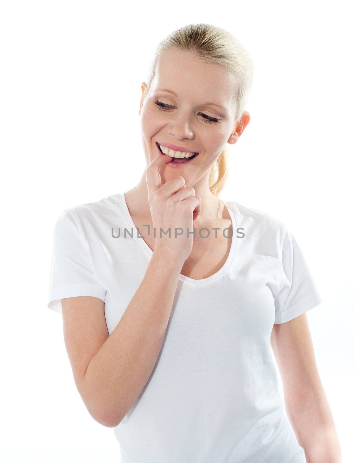 Close-up of mischievious girl looking at something interesting and thinking wild