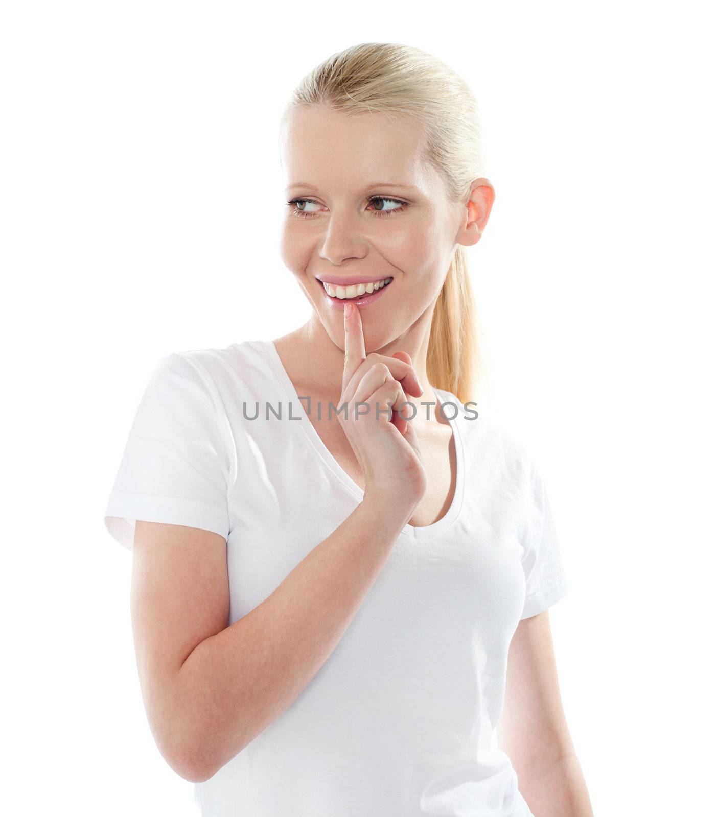 Portrait of smiling mischievious female isolated on white background