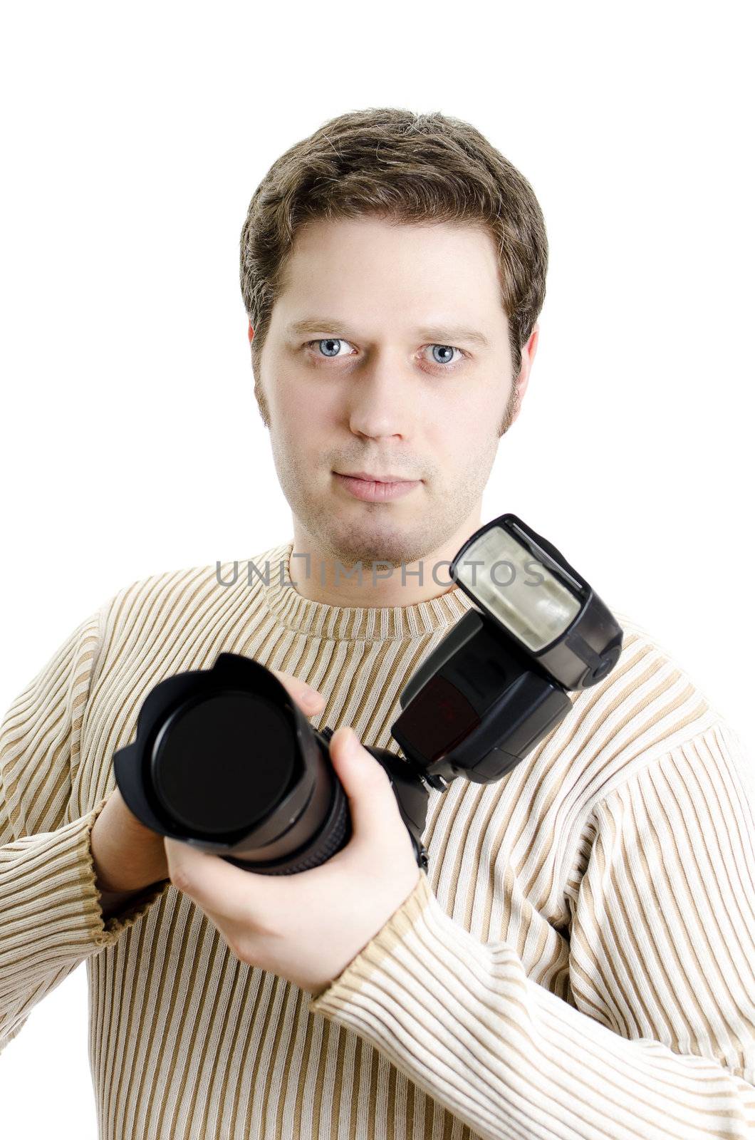 Photojournalist holding camera with flash. Isolated on white.