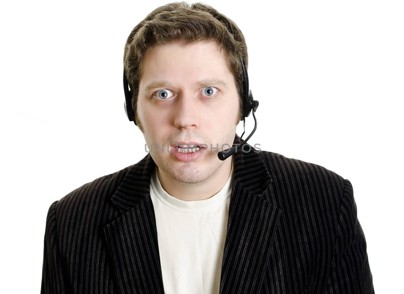 Sports commentator or Customer support with headphones in shock. Isolated on white.