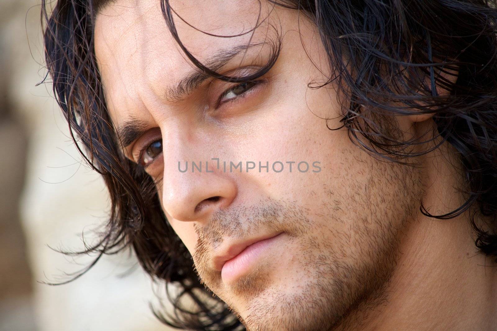 Closeup of italian male model thinking  by fmarsicano