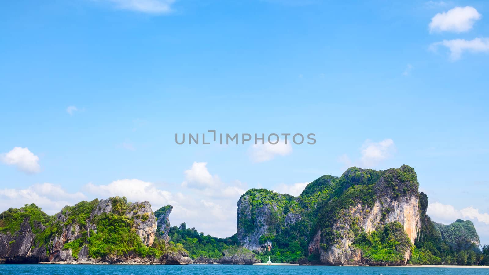 tall cliff with trees at Andaman Sea, Thailand