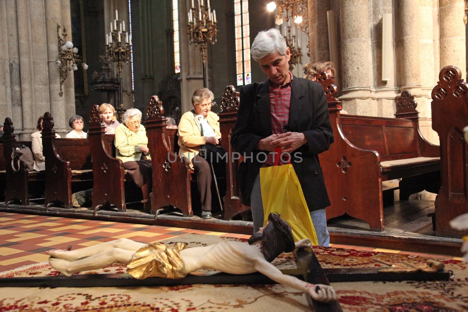 ZAGREB, CROATIA - APRIL 11: On Holy Saturday, people pray in front of God's tomb in the Zagreb Cathedral, April 11, 2009 in Zagreb, Croatia.