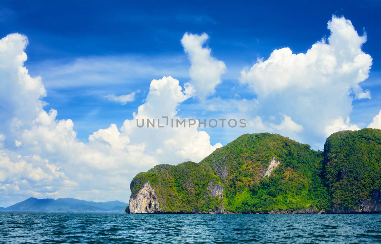 tall cliff with trees at Andaman Sea, Thailand