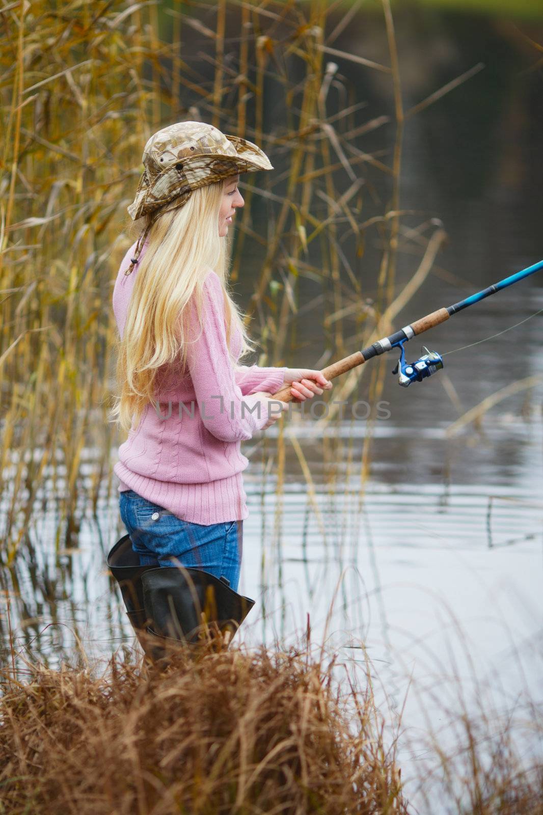 Woman Fishing by petr_malyshev