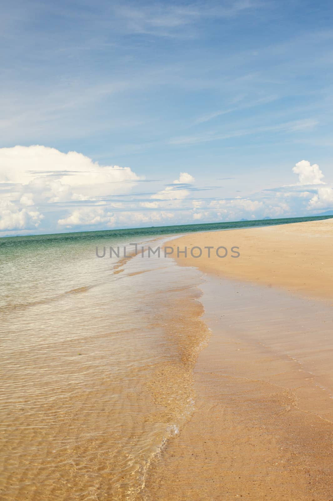 sunny beach, blue ocean and clean sky