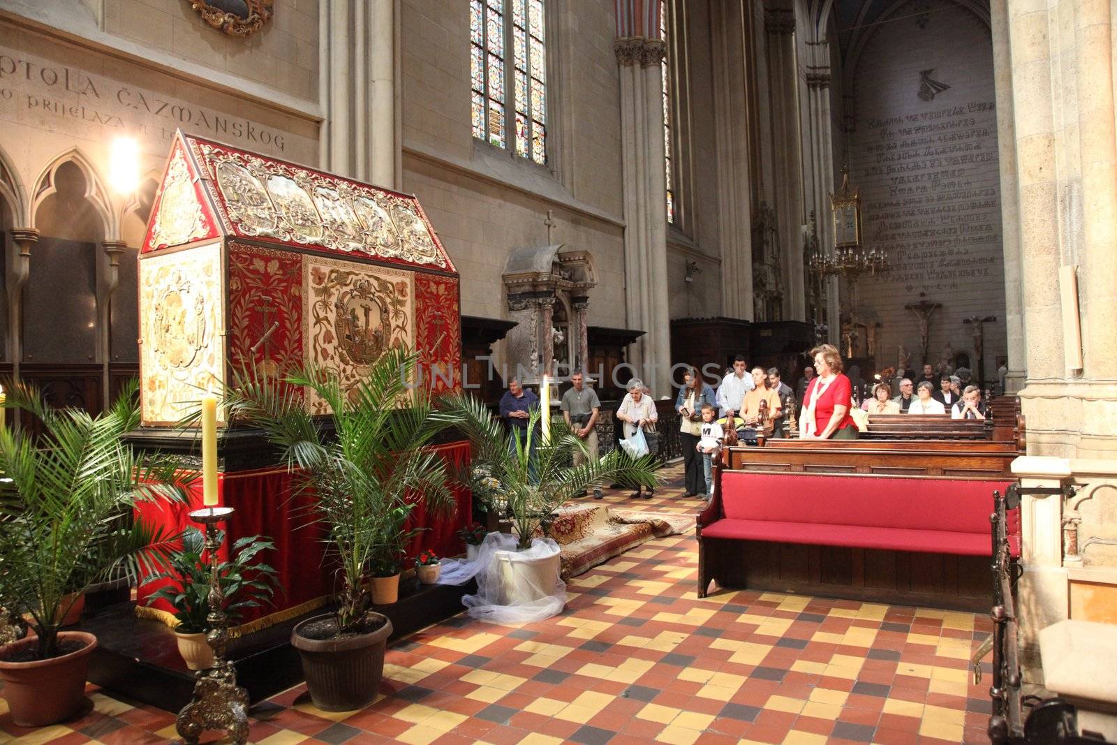ZAGREB, CROATIA - APRIL 11: On Holy Saturday, people pray in front of God's tomb in the Zagreb Cathedral, April 11, 2009 in Zagreb, Croatia.
