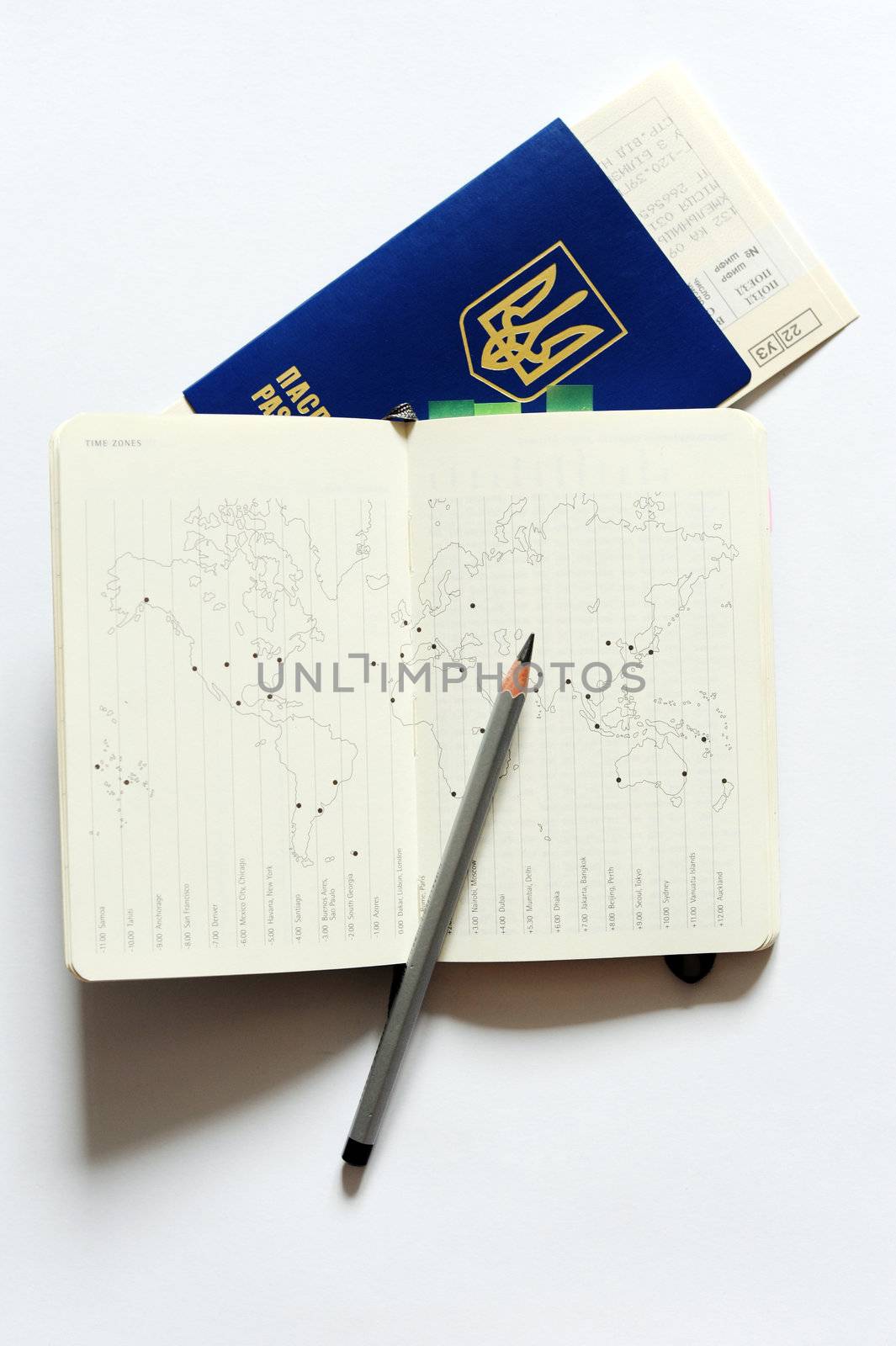 An image of a map and a passport on white background