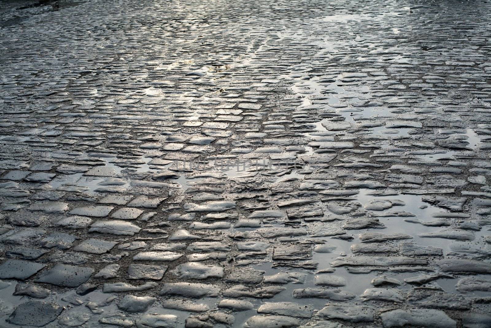 An image of road of grey stones