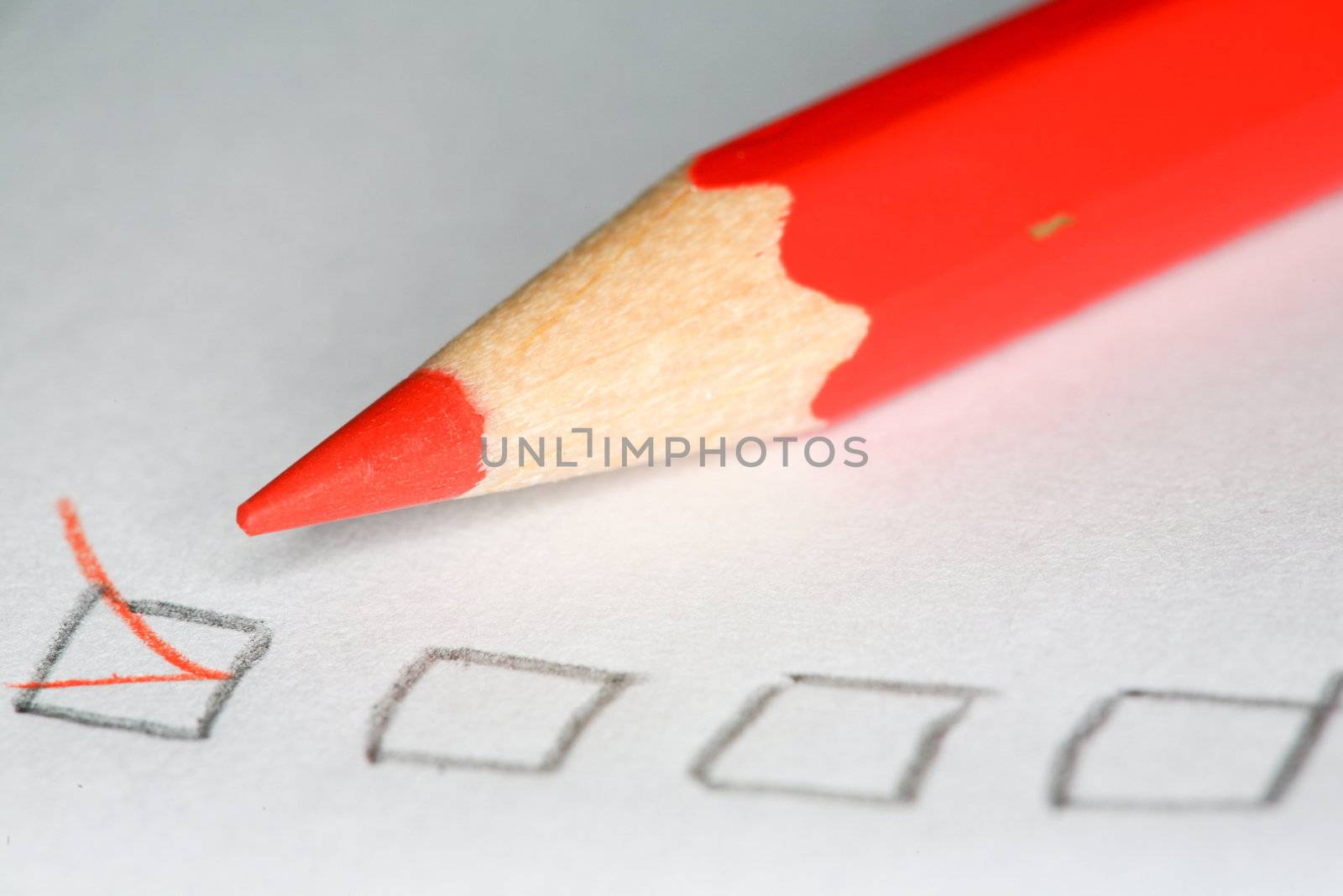 An image of color pencil checking a box