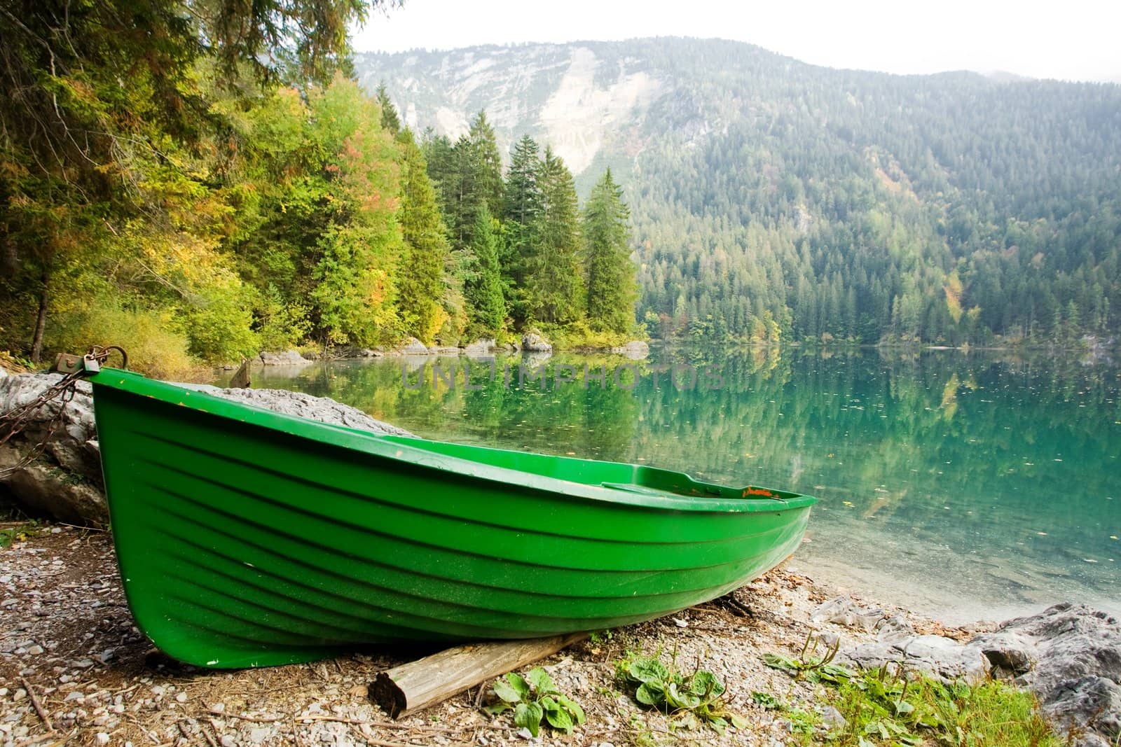 An image of a boat at beautiful lake