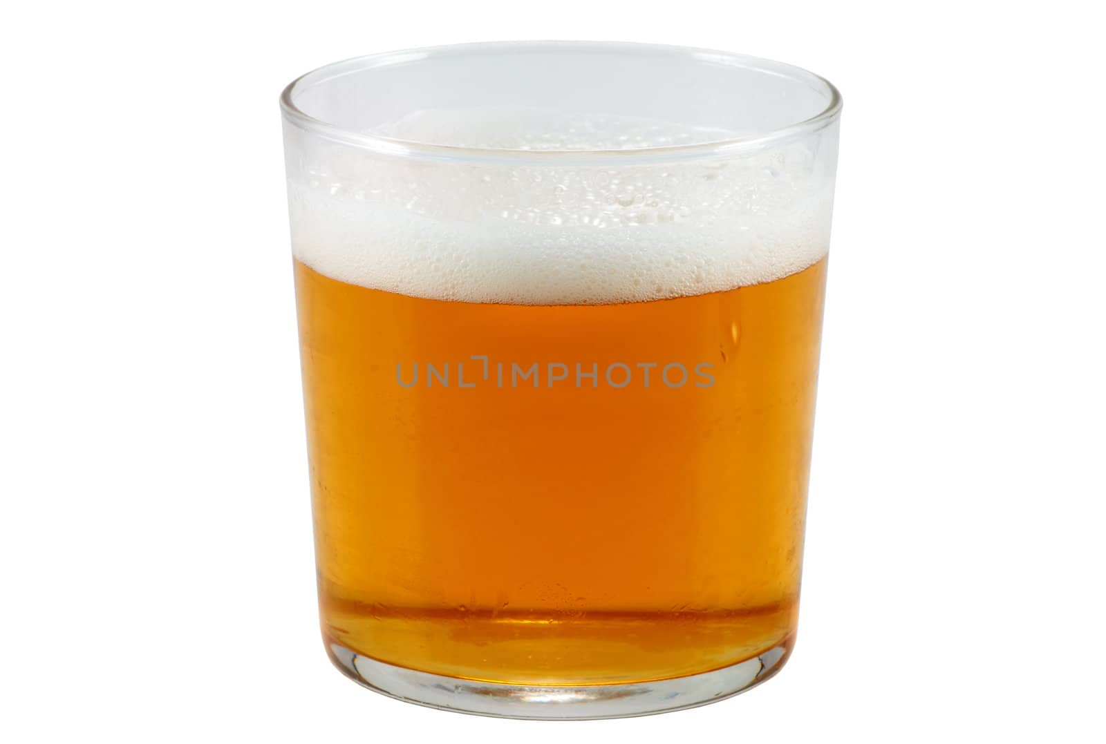 glass of beer made with natural ingredients cut horizontally