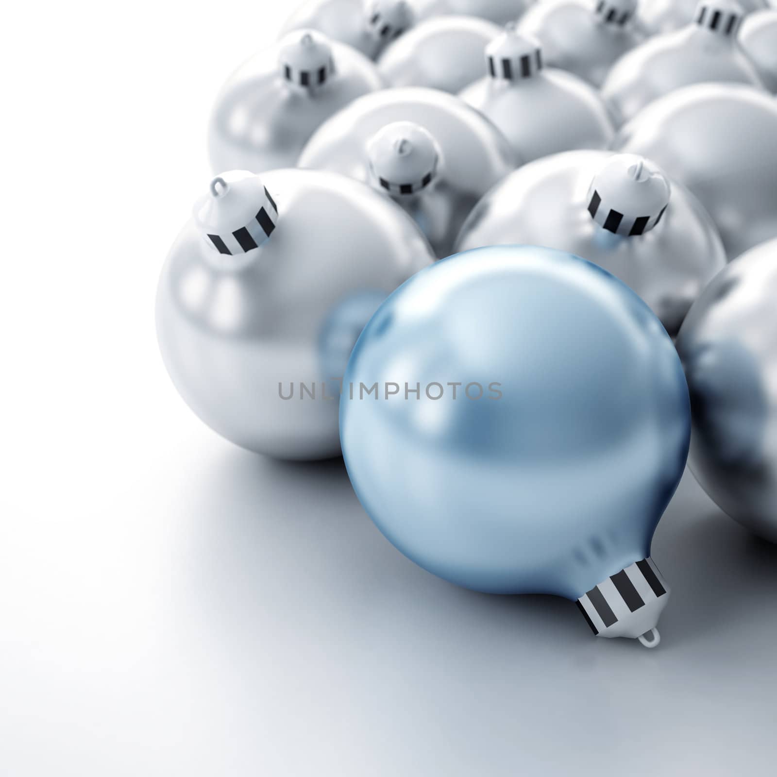 Christmas toys of silver color in the form of spheres on a white background