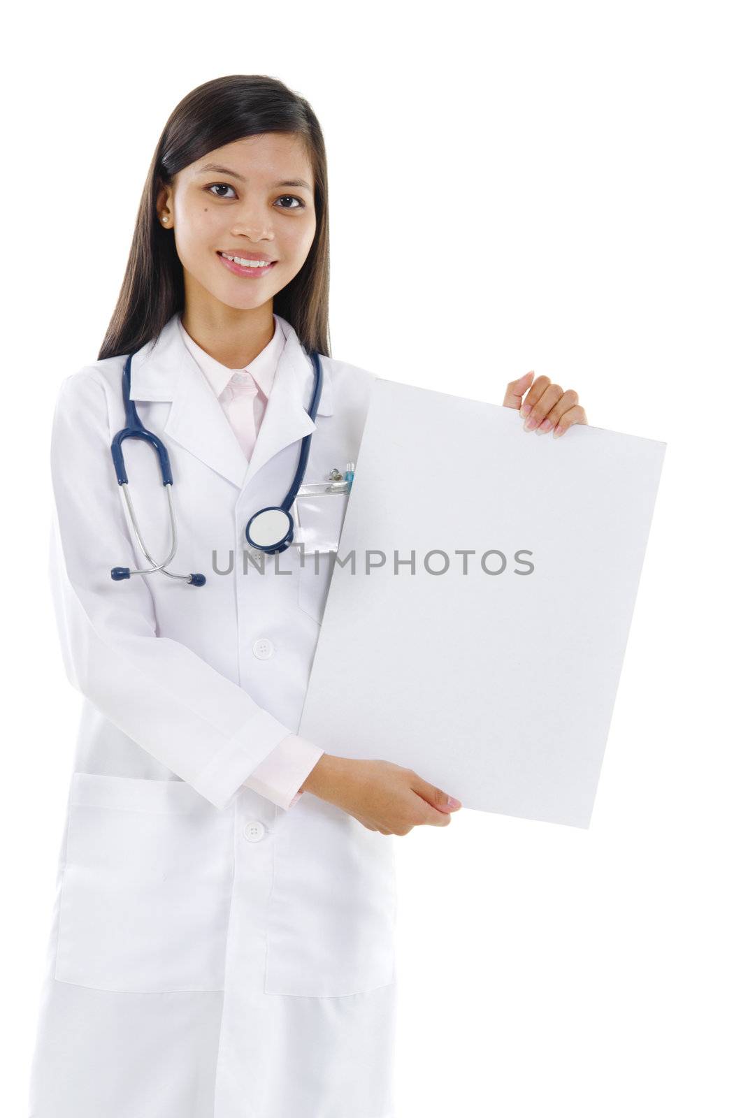 Mixed race female doctor showing blank board on white background