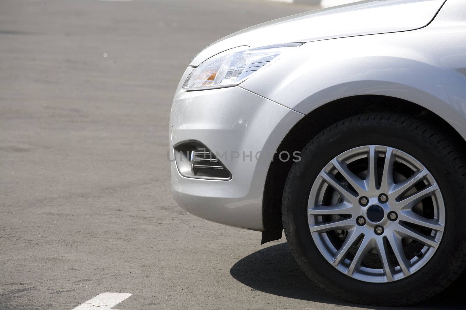 wheel modern passenger car on parking