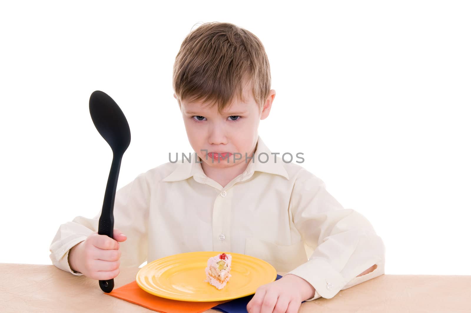 child with a large spoon isolated on white background