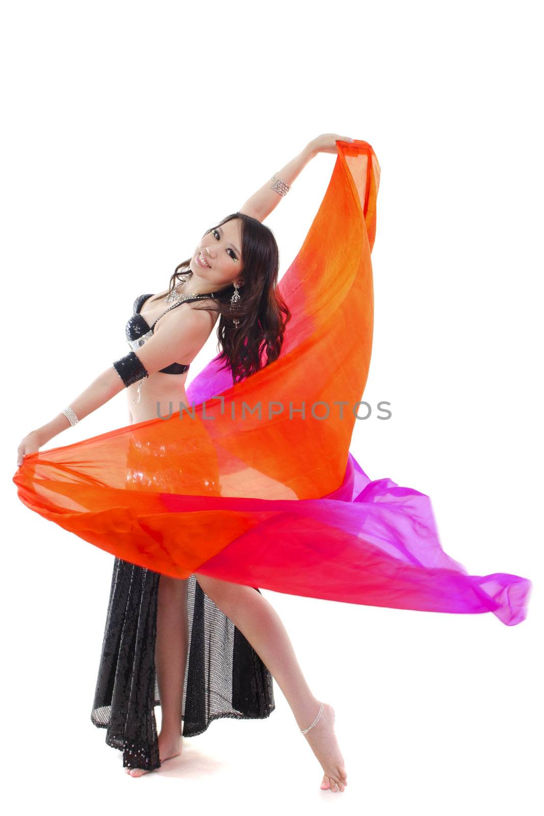 Belly dancer dancing with her veil