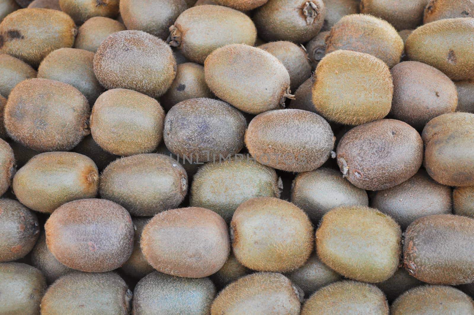 Kiwifruit aka kiwi, green edible berry fruit